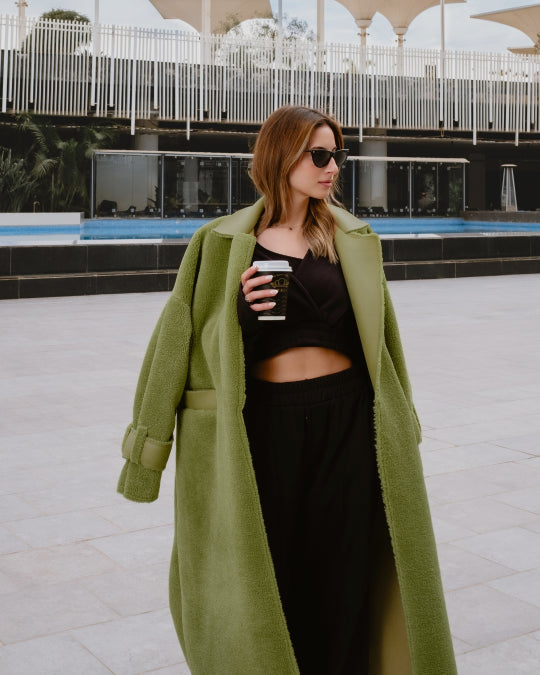 green teddy coat